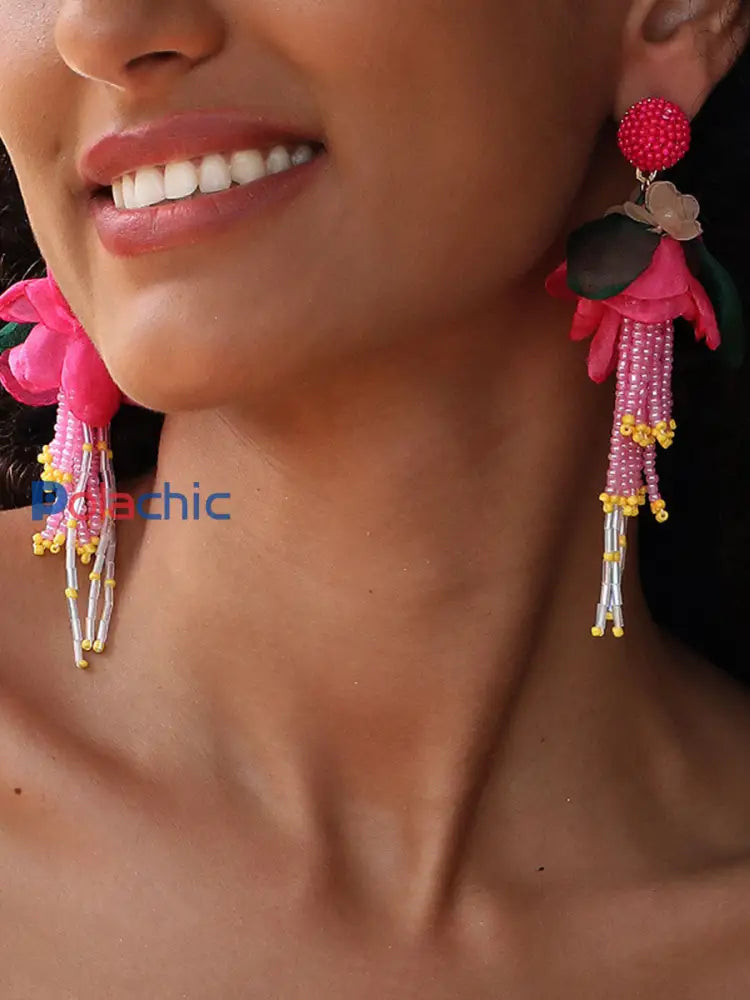 Boucles d’oreilles femme rose fleurs cancer du sein