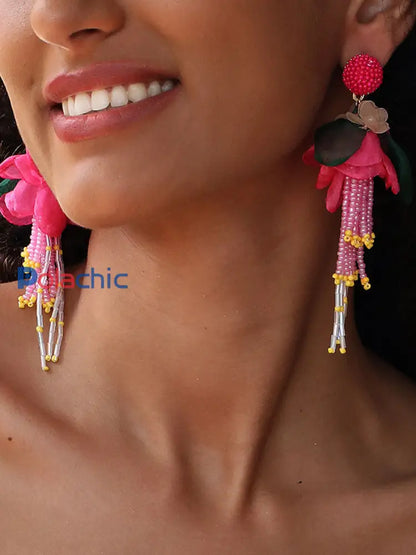 Boucles d’oreilles femme rose fleurs cancer du sein