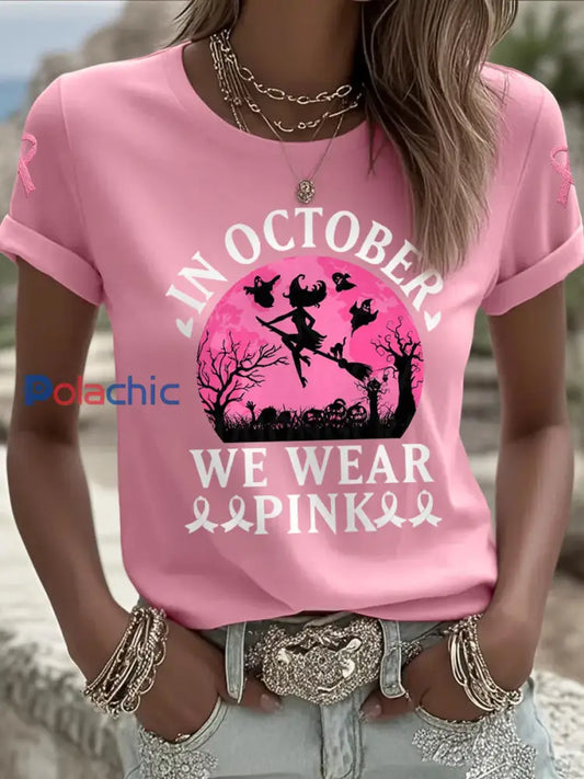 La sorcière d’Halloween des femmes en octobre nous portons un tee-shirt rose de sensibilisation au cancer du sein Rose