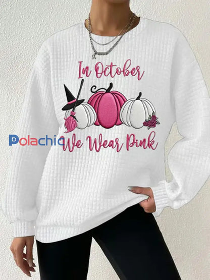 Sensibilisation au cancer du sein pour femmes en octobre Nous portons un sweat-shirt décontracté imprimé gaufré rose