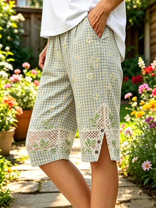 Pantalon mi-long en coton et lin à motif floral pour femme