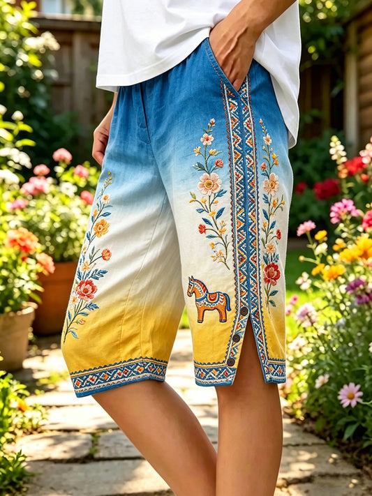Pantalon mi-long en coton et lin à motif floral pour femme