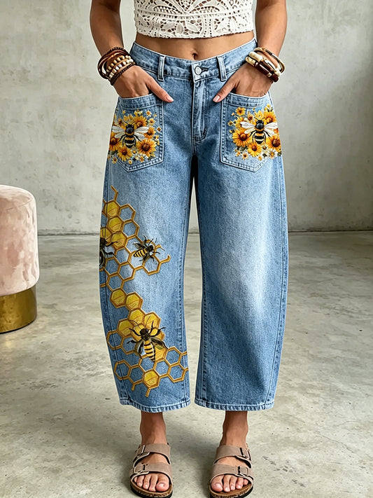 Pantalon à poches avec impression artistique de femmes et d’abeilles